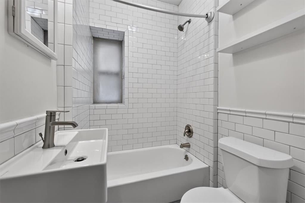 Tiled shower at 4232 Campbell Street, Kansas City, MO 64110