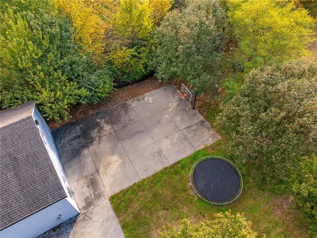 Home gym and basketball hoop at 9260 Oakcrest Drive, Lenexa, KS 66227