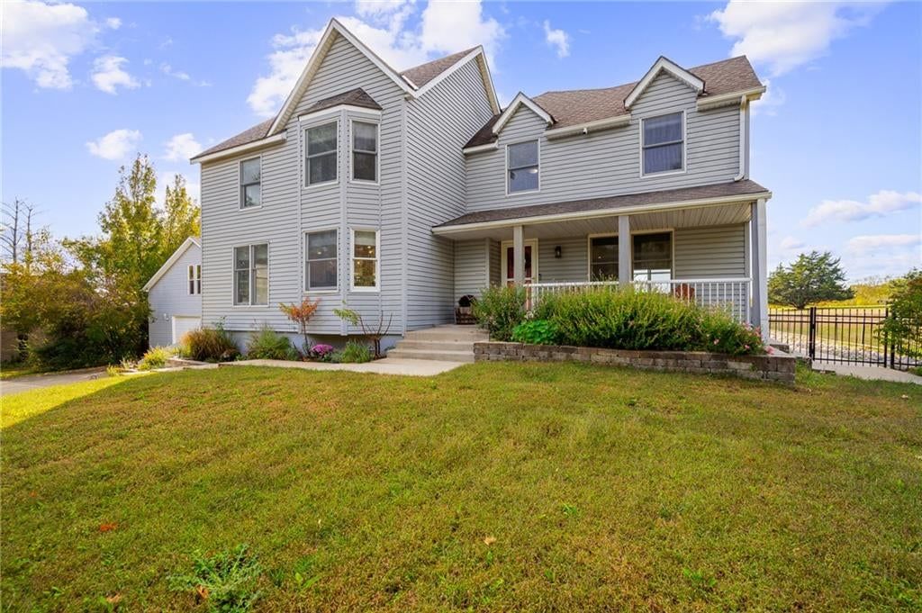 Covered front porch at 9260 Oakcrest Drive, Lenexa, KS 66227