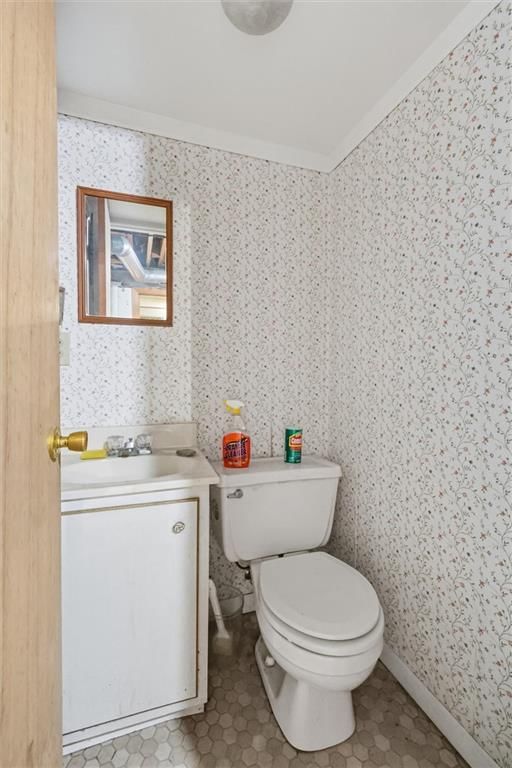 White vanity and gold hardware at 24 Fairview Avenue, Liberty, MO 64068