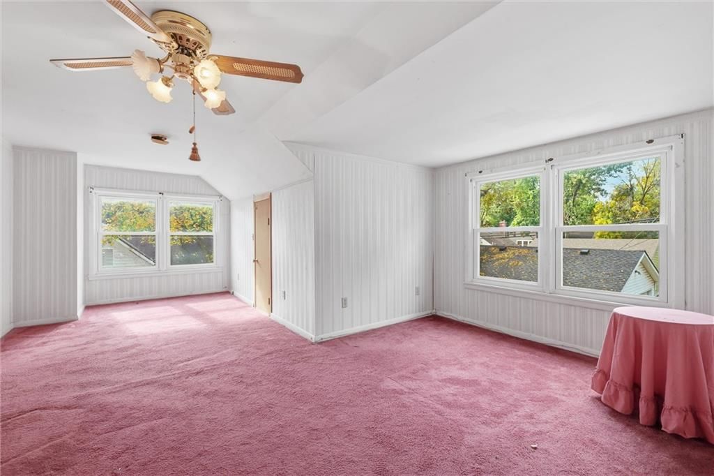 Wall of windows and carpet at 24 Fairview Avenue, Liberty, MO 64068