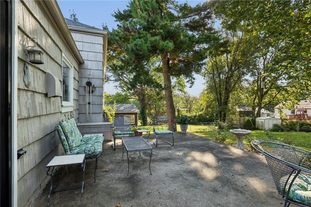 Concrete patio at 1513 NE Englewood Road, Kansas City, MO 64118