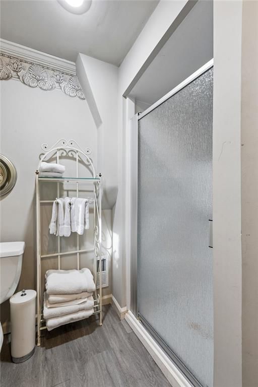 Tiled shower at 1513 NE Englewood Road, Kansas City, MO 64118