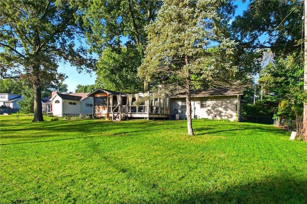 Big backyard, fenced yard and wood fence at 9815 Howe Drive, Overland Park, KS 66206