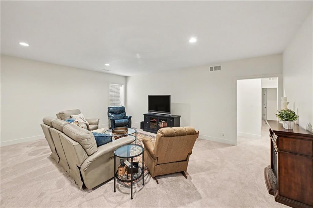 Finished basement, fireplace and carpet at 19920 NE F Highway, Smithville, MO 64089