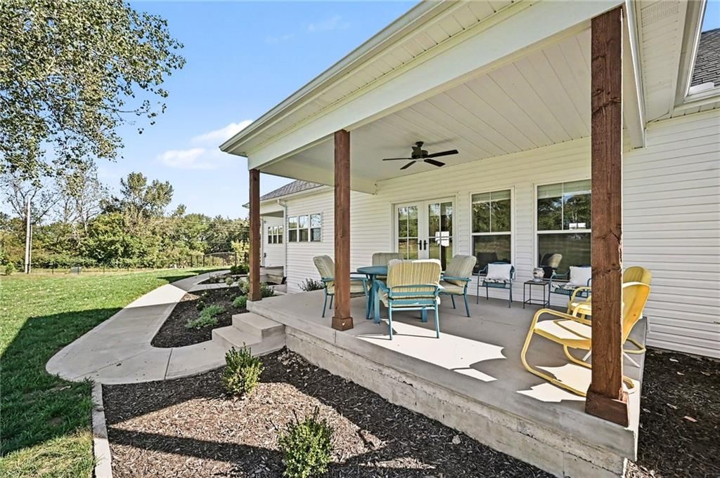 Covered patio and concrete patio at 19920 NE F Highway, Smithville, MO 64089