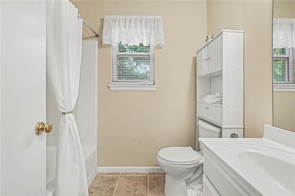 Tile floors at 17405 MONTGALL Drive, Belton, MO 64012