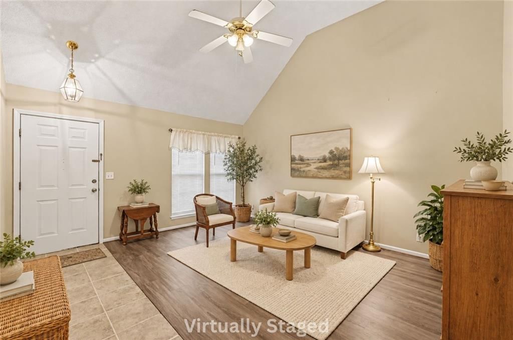 Tall ceilings, open floor plan and hardwood floors at 17405 MONTGALL Drive, Belton, MO 64012