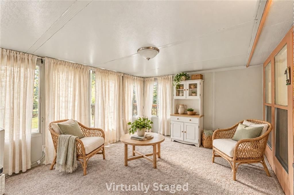 Wall of windows at 17405 MONTGALL Drive, Belton, MO 64012