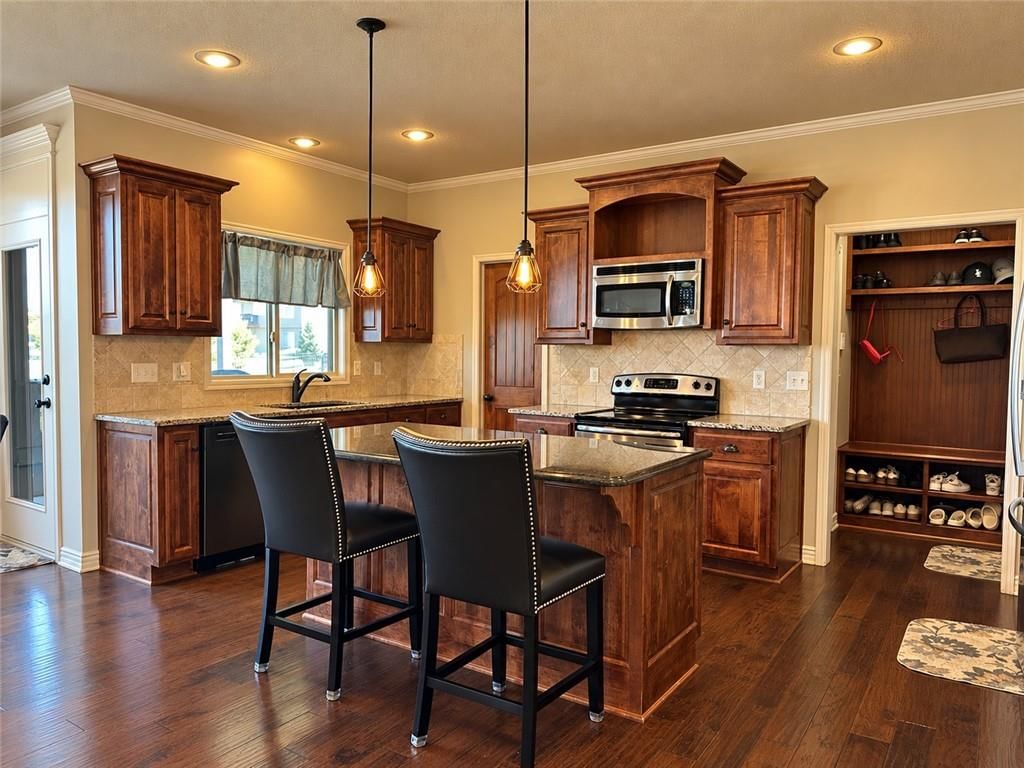Photo 6 of 25 - 1212 High Ridge Court, Raymore, MO 64083