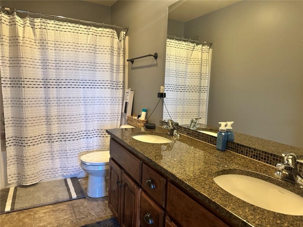 Photo 25 of 25 - 1212 High Ridge Court, Raymore, MO 64083