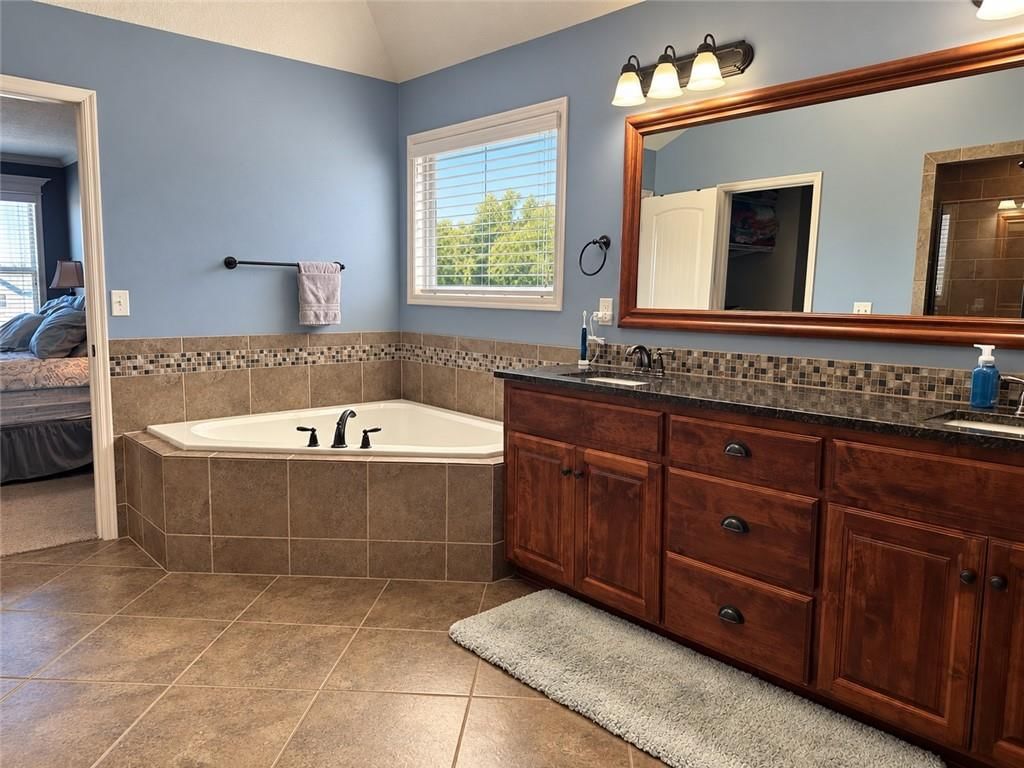 Photo 21 of 25 - 1212 High Ridge Court, Raymore, MO 64083