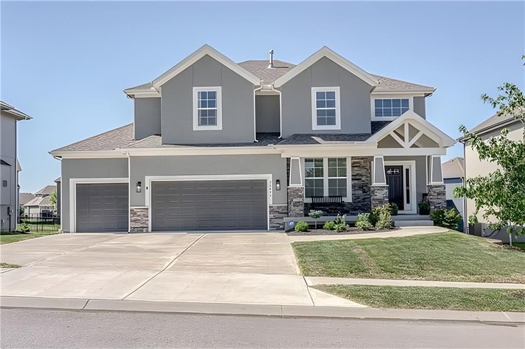 Photo 1: three-car garage, 20435 W 107th Place, Olathe, KS 66061