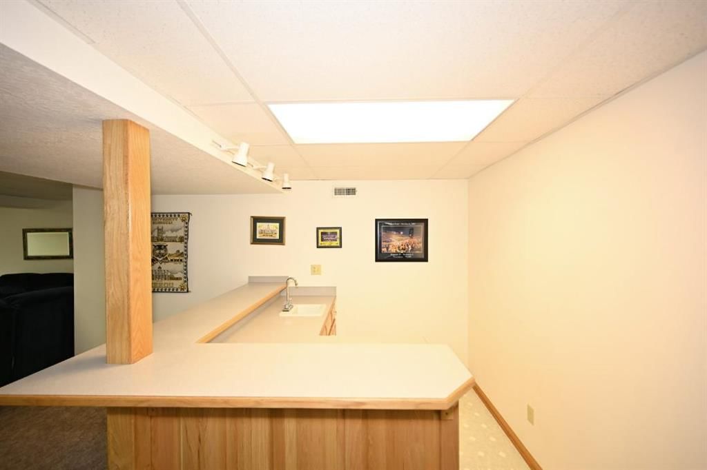 Finished basement and wet bar at 14 Pine View Road, Platte City, MO 64079