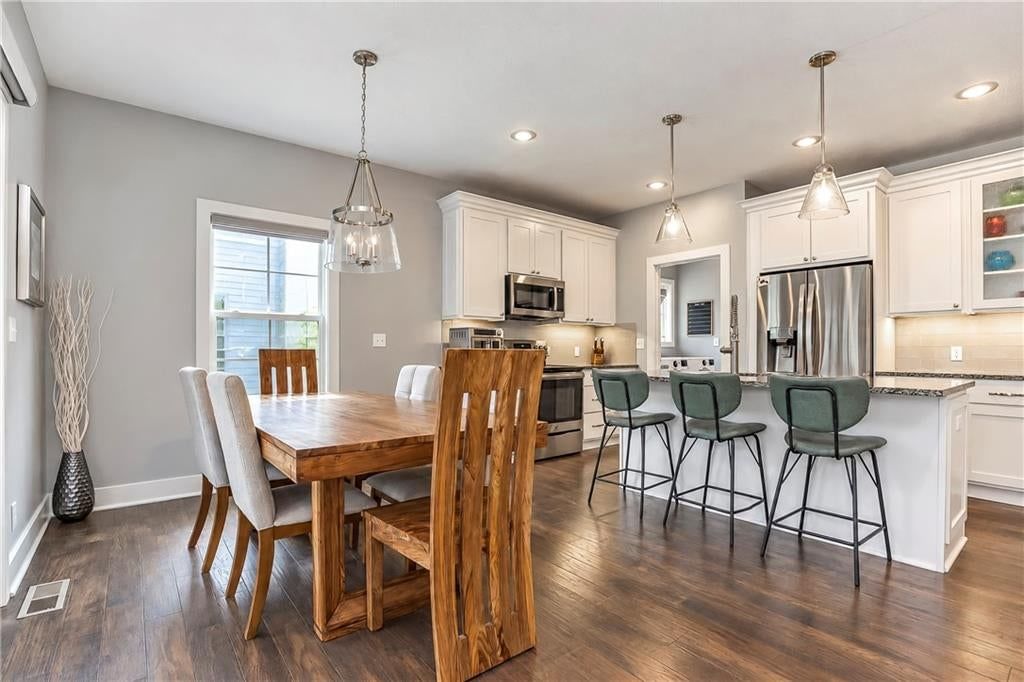 Photo 6: white kitchen cabinets, 8513 Constance Street, Lenexa, KS 66215