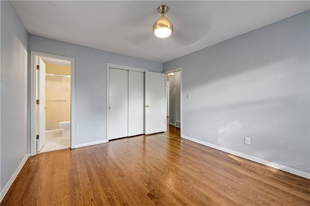Walk-in closet at 10130 Horton Drive, Overland Park, KS 66207