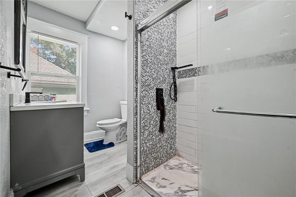 Walk-in shower and private toilet room at 801 N 11th Street, Kansas City, KS 66102