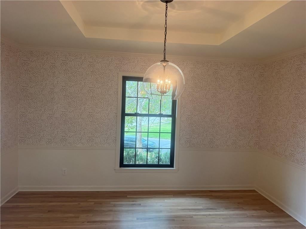 Statement lighting and tray ceiling at 12001 ABERDEEN Street, Leawood, KS 66209