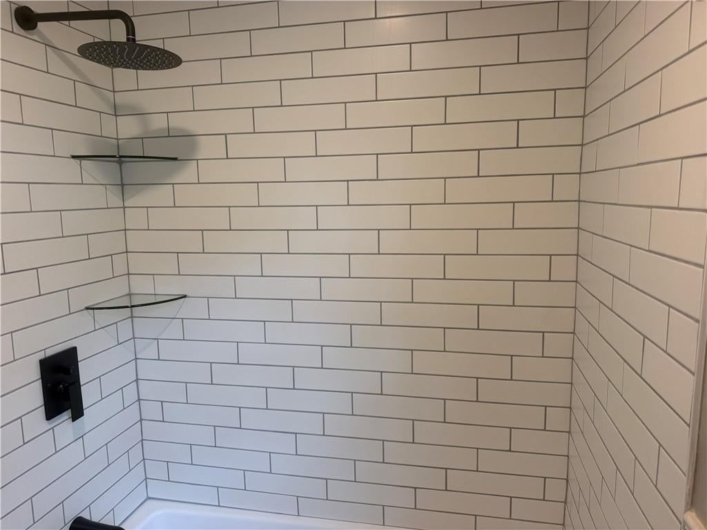 Tiled shower at 12001 ABERDEEN Street, Leawood, KS 66209
