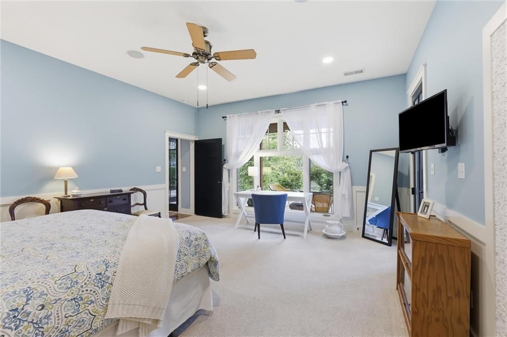 Bedroom sitting area at 43 L Street, Lake Lotawana, MO 64086