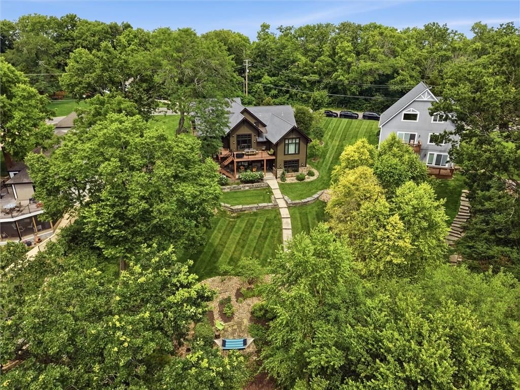 Big backyard, mature trees and flat lot at 43 L Street, Lake Lotawana, MO 64086