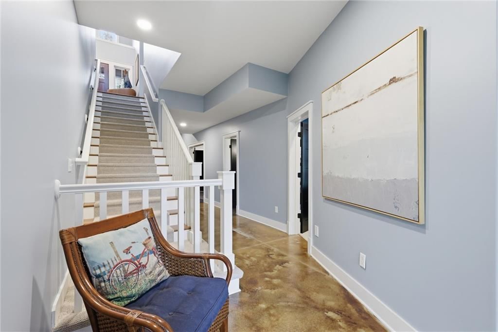Staircase and wood stair railing at 43 L Street, Lake Lotawana, MO 64086