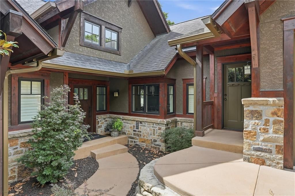 Covered front porch at 43 L Street, Lake Lotawana, MO 64086