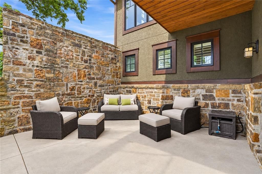 Concrete patio at 43 L Street, Lake Lotawana, MO 64086