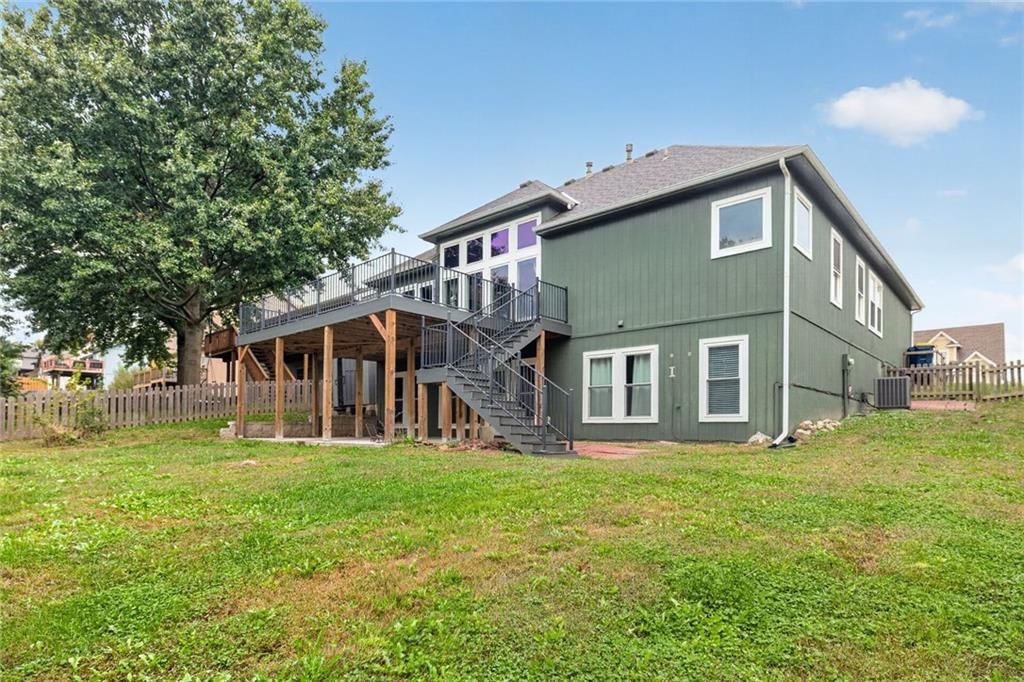 Covered patio and flat lot at 413 Shannon Avenue, Smithville, MO 64089
