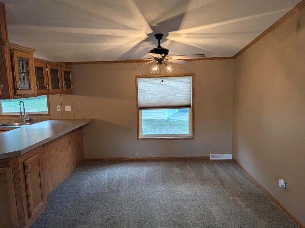 Breakfast nook at 846 NE White Oaks Lane, Oak Grove, MO 64075