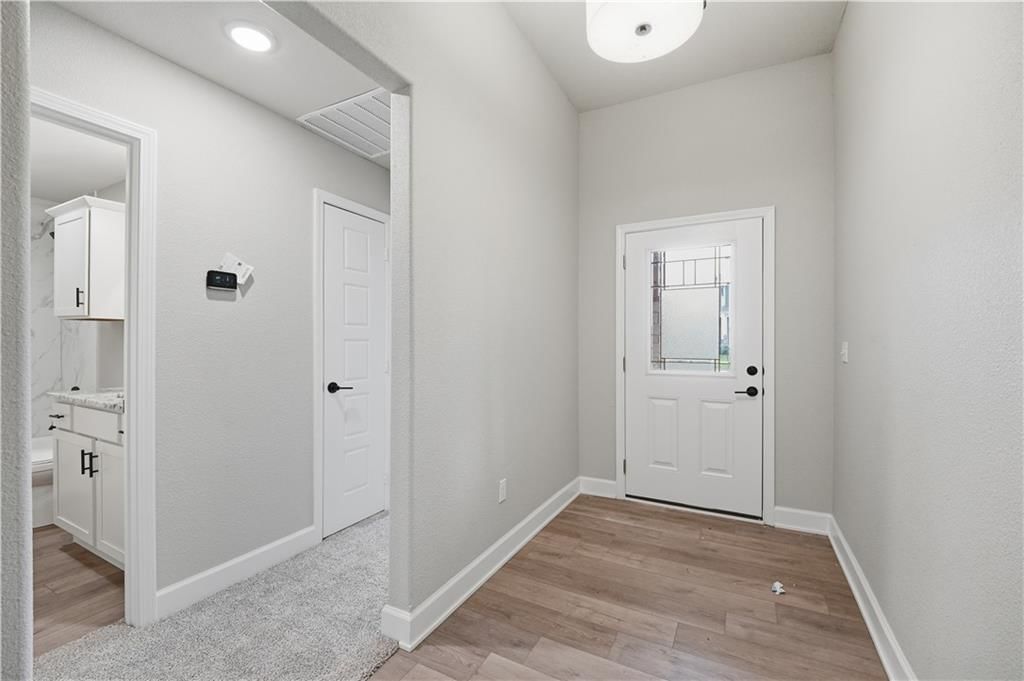 Hardwood floors and walk-in closet at 18450 W 195th Street, Spring Hill, KS 66083