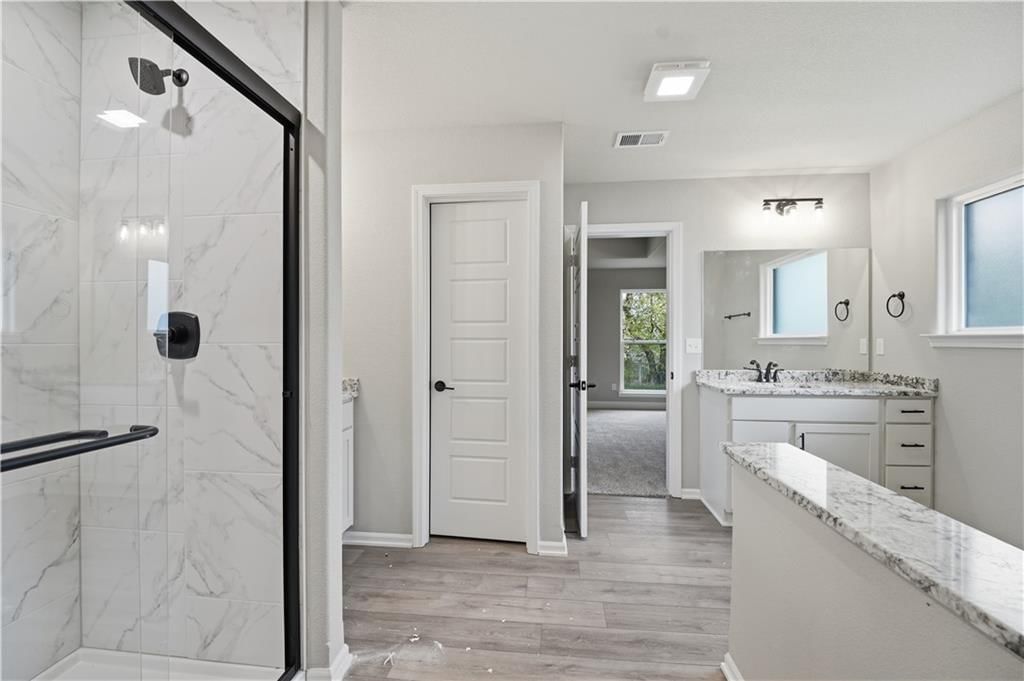 Tiled shower at 18450 W 195th Street, Spring Hill, KS 66083