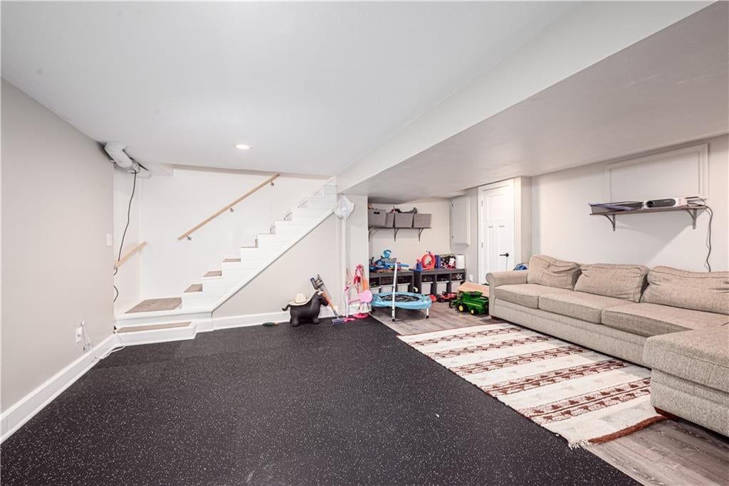 Open-riser staircase and staircase at 102 W Kansas Avenue, Lansing, KS 66048