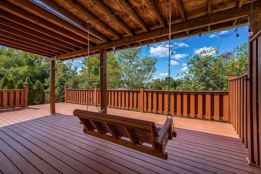 Deck, big backyard and composite deck at 9921 N Highland Place, Kansas City, MO 64155