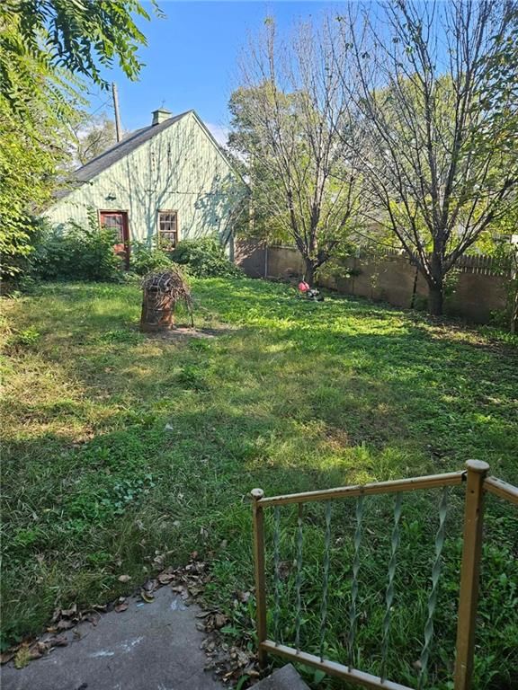 Big backyard, mature trees and cape cod style at 1733 S Crescent Avenue, Independence, MO 64052