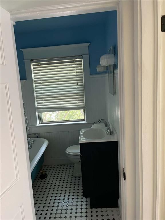 Tile floors and tub and shower combo at 1733 S Crescent Avenue, Independence, MO 64052