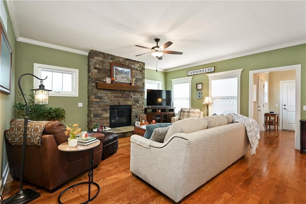 Fireplace, open floor plan and stone fireplace at 3317 SW Longview Road, Lee's Summit, MO 64081