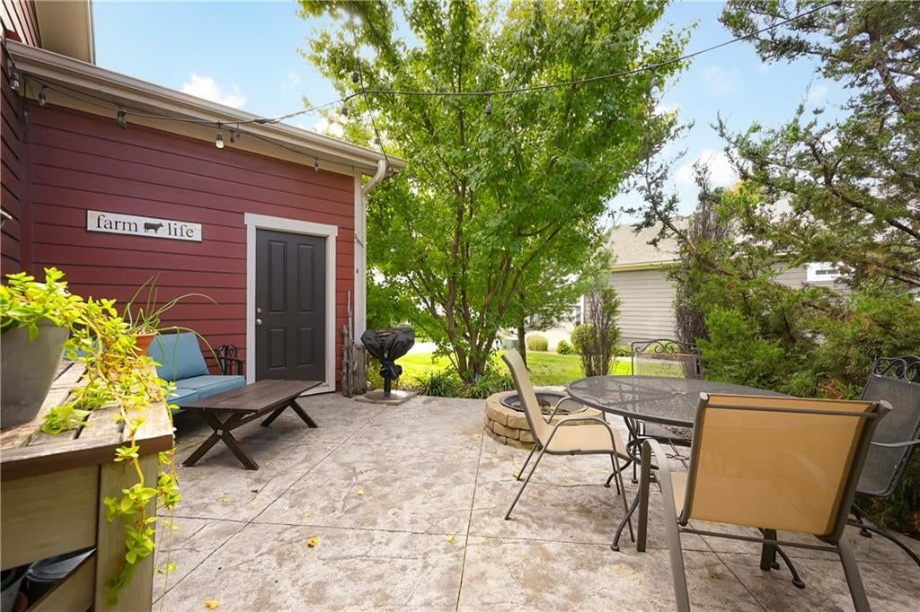 Fire pit and paver patio at 3317 SW Longview Road, Lee's Summit, MO 64081