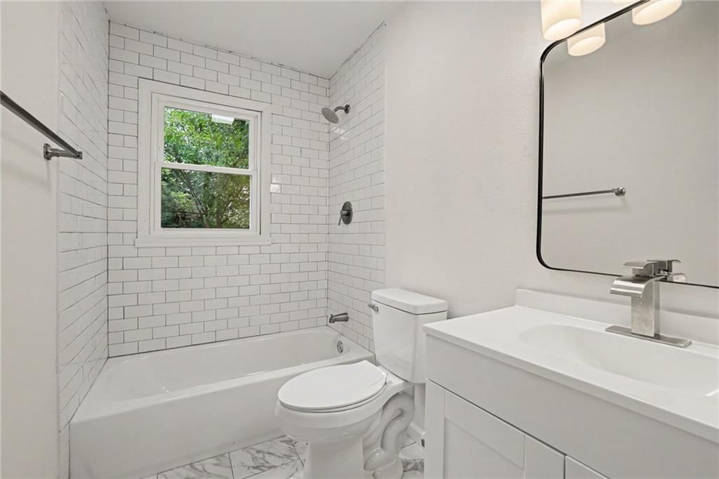 Renovated bathrooms at 8507 Kentucky Avenue, Raytown, MO 64138