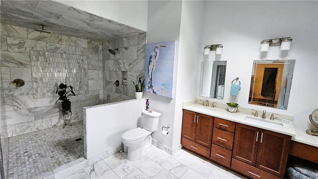 Walk-in shower, tiled shower and frameless glass shower at 12580 S Red Bird Lane, Olathe, KS 66061