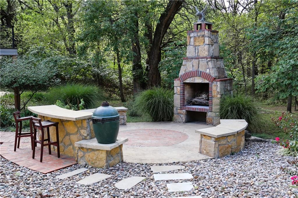 Outdoor fireplace at 12580 S Red Bird Lane, Olathe, KS 66061
