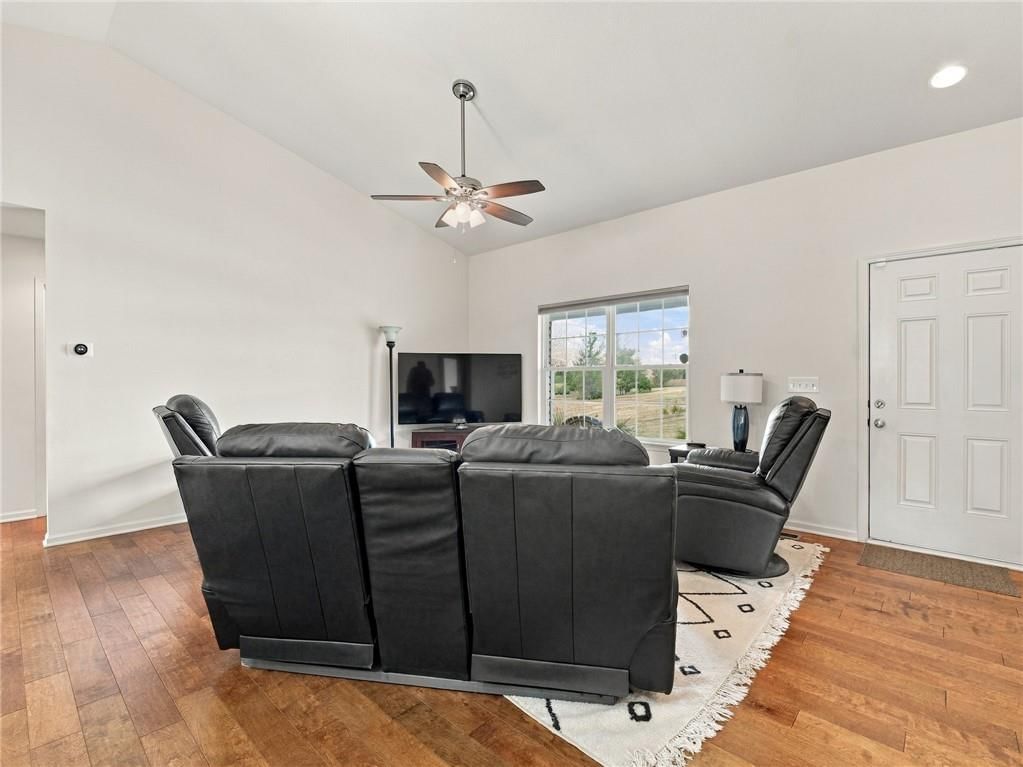 Tall ceilings, hardwood floors and recessed lighting at 7305 E 143rd Street, Grandview, MO 64030