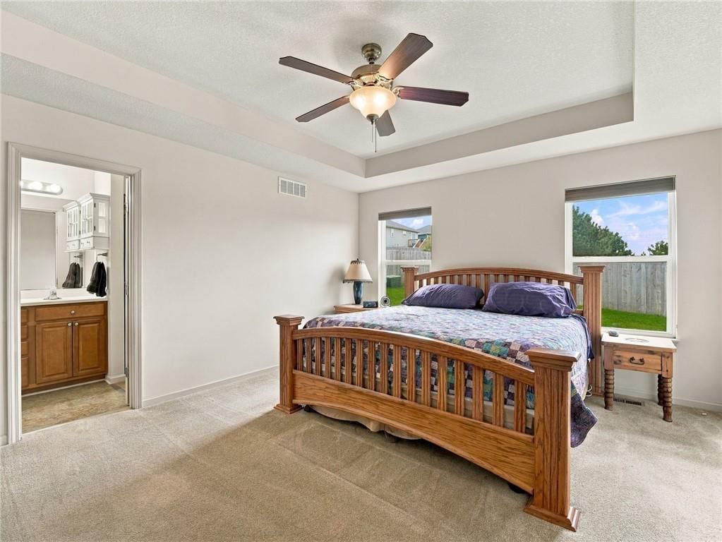 Tray ceiling and carpet at 7305 E 143rd Street, Grandview, MO 64030