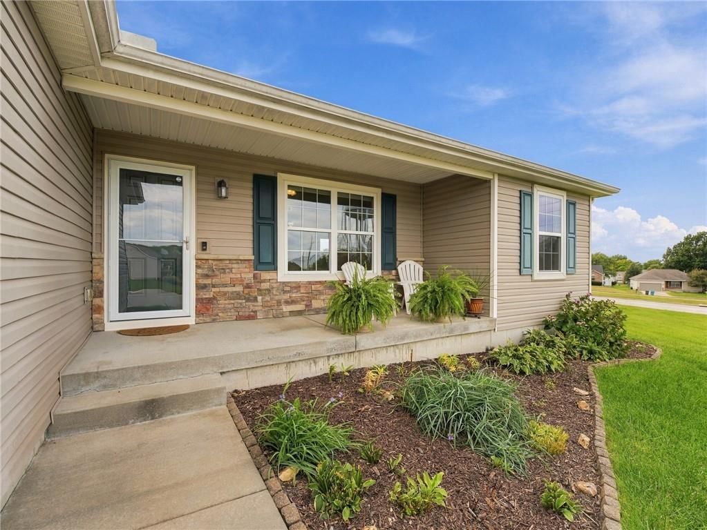 Covered front porch at 7305 E 143rd Street, Grandview, MO 64030