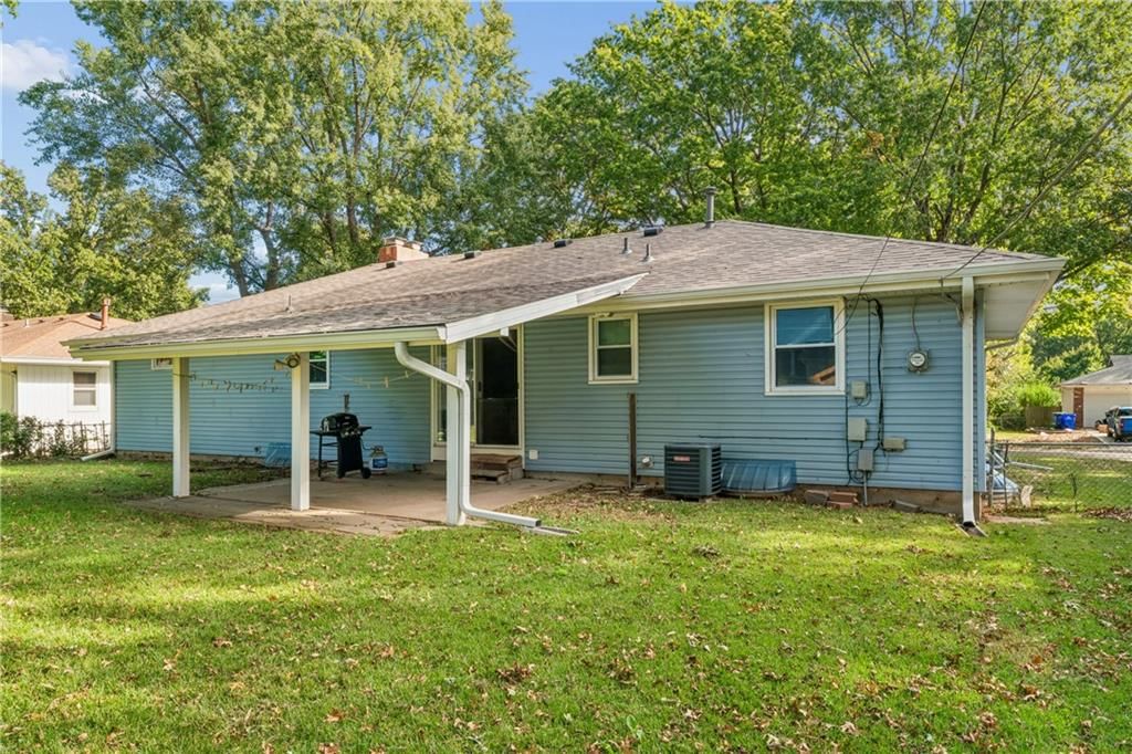 Big backyard, fenced yard and mature trees at 6808 Larsen Lane, Shawnee, KS 66203