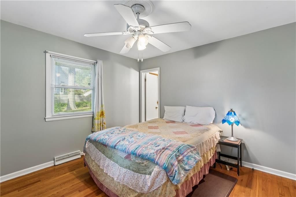 Main-floor primary bedroom at 6808 Larsen Lane, Shawnee, KS 66203