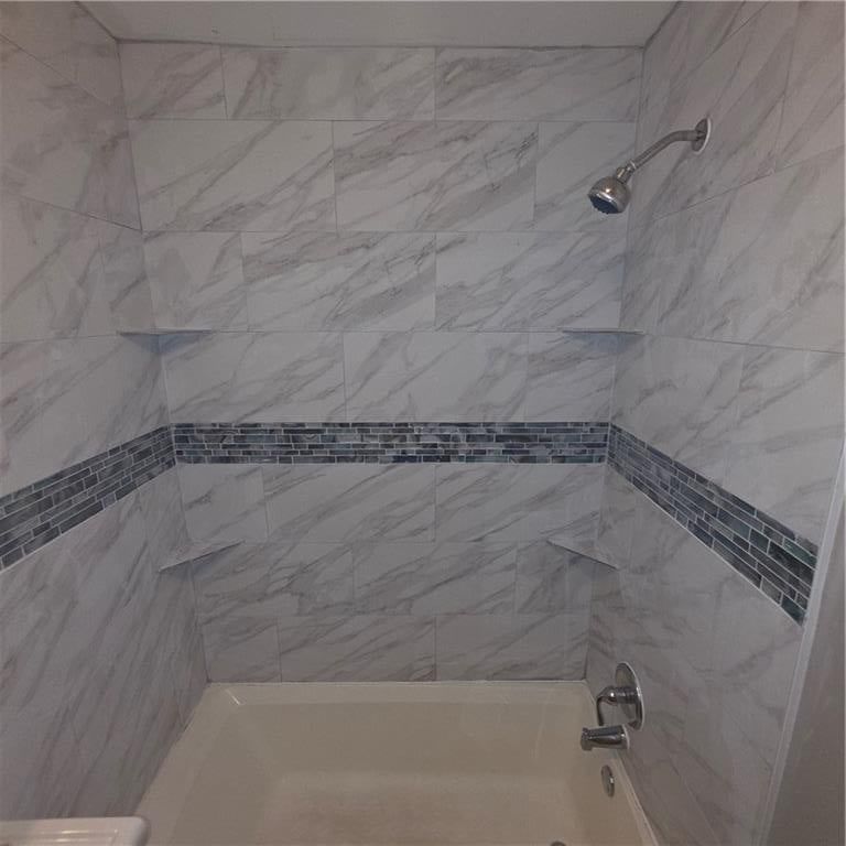 Tiled shower at 5737 INDIANA Avenue, Kansas City, MO 64130