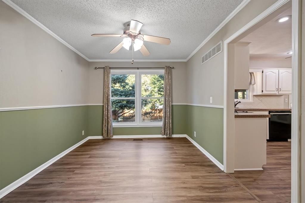 Wainscoting or board and batten at 1425 N Hunter Drive, Olathe, KS 66061