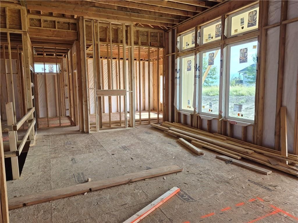 Floor-to-ceiling windows and wall of windows at 14617 Aspen Circle, Basehor, KS 66007