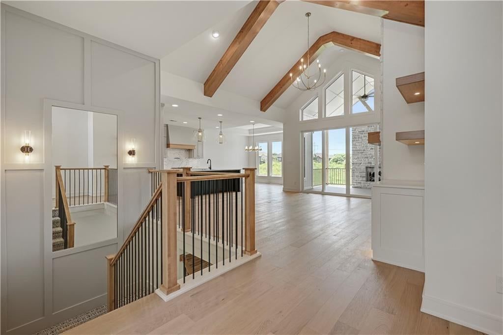 Tall ceilings, recessed lighting and staircase at 15300 W 161st Court, Olathe, KS 66062